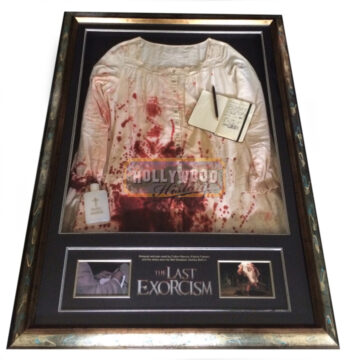 nell sweetzer's (ashley bell) dress, notepad, pen and holy water