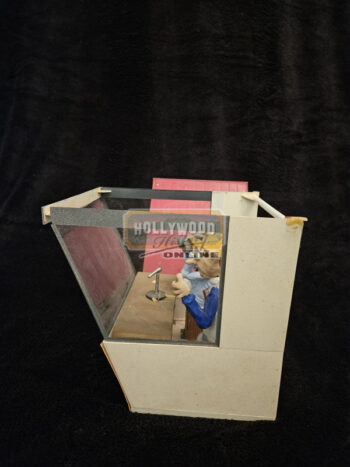 The Fliver 500 Booth And Announcer Puppets